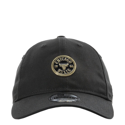 Black baseball cap with embroidered Chicago Bulls gold badge and curved brim