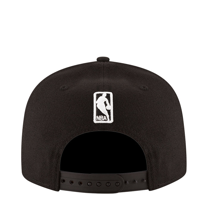 Black baseball cap with rectangular NBA logo patch on the back