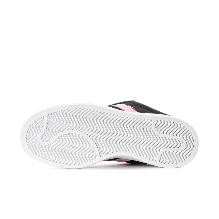 Black sneaker outsole with white rubber tread and pink stripe edge detail.