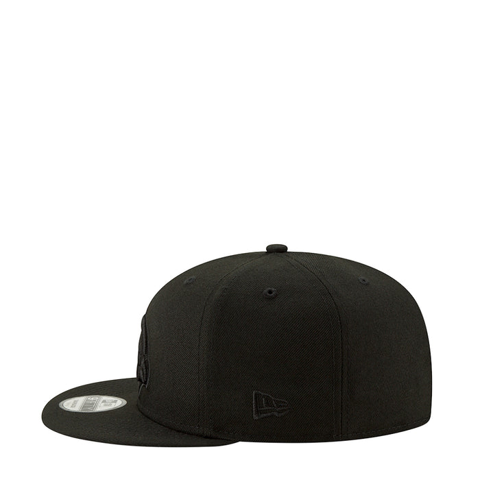 Black snapback cap with small embroidered bird logo patch