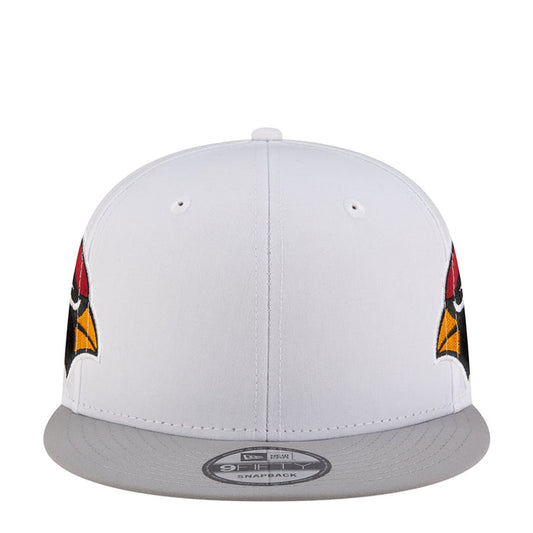 White snapback cap with gray brim and side logo accents in red and yellow