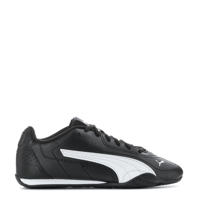 Youth black low-top sneaker with white PUMA formstrip and lace-up front