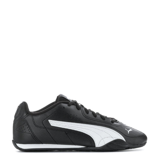 Youth black low-top sneaker with white PUMA formstrip and lace-up front
