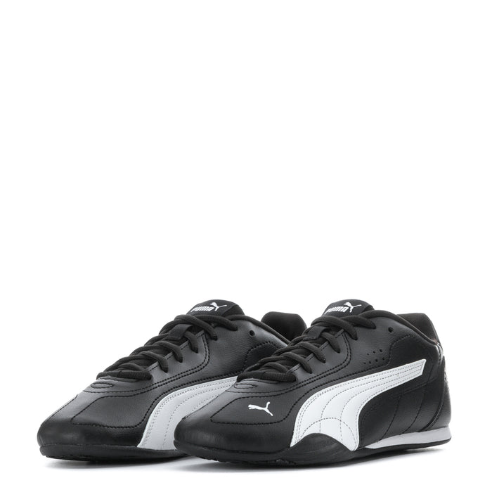 Youth black low-top sneakers with white stripes and PUMA logos, lace-up