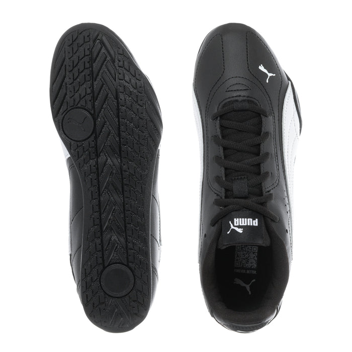 Youth sneaker outsoles and inner view, black upper with laces and PUMA logo