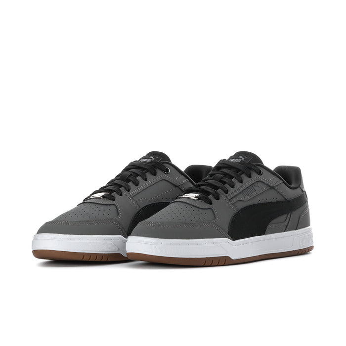 Men's Puma Caven III low-top sneakers, dark gray uppers with black logo and white midsole.