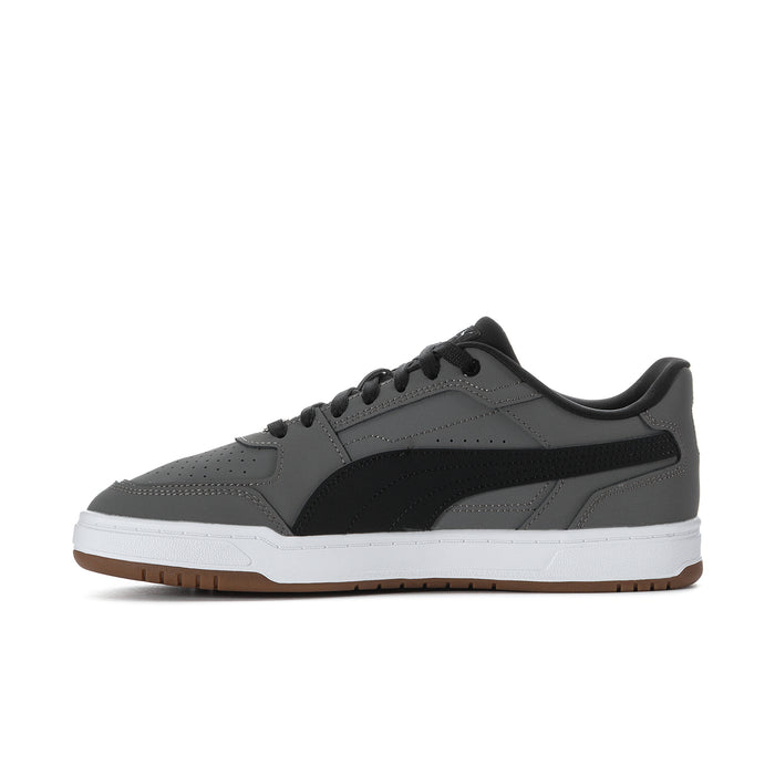 Men's Puma Caven III low-top sneakers, perforated toe, black side panel, gum outsole.