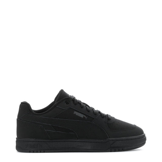 Puma youth low-top sneakers in black with suede-style panels and lace-up design