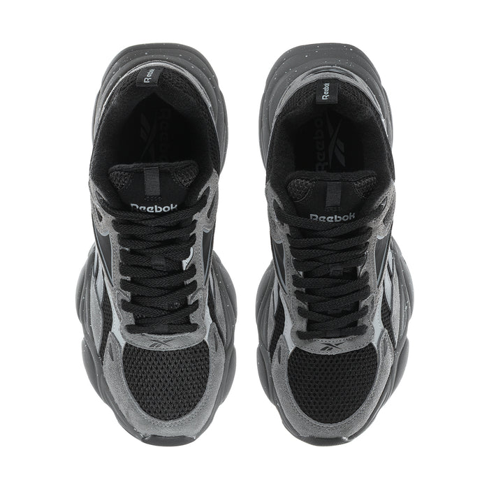 Men's grey and black lace-up running sneakers, close-up of tongues and uppers