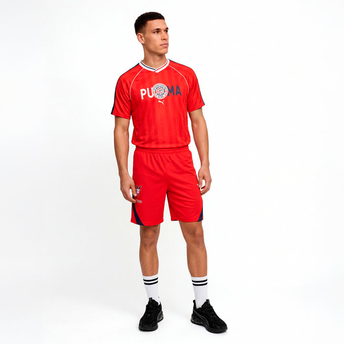 Men's red soccer jersey with V-neck, white trim, and chest crest with Puma mark.