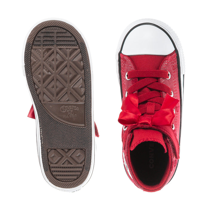 Toddler high-top sneakers showing tread sole and red canvas heel