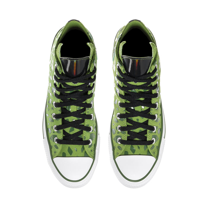 Pair of bright green high-top sneakers with black laces and white rubber toe caps