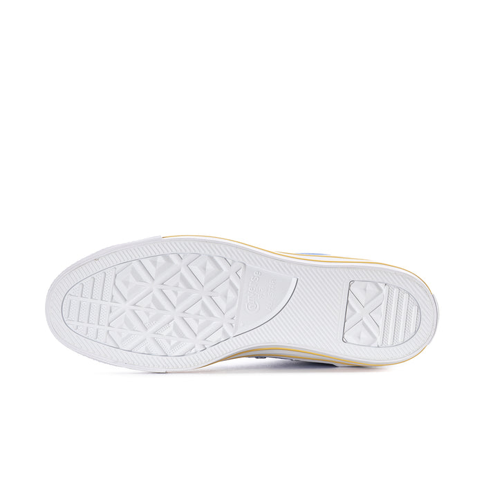 Outsole view of blue high-top sneakers with white tread and yellow-edged rubber sidewall