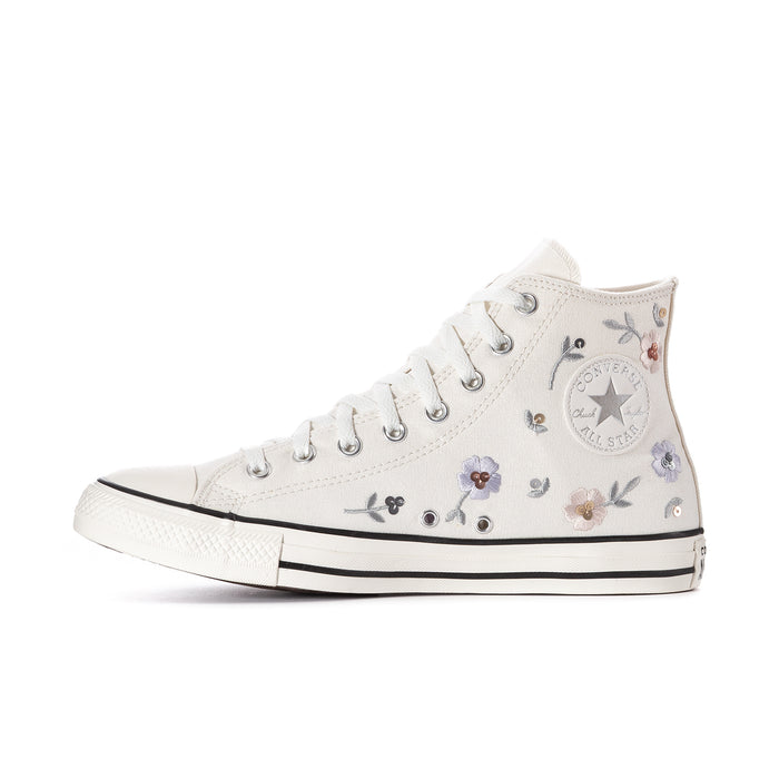 White women's high-top sneakers with floral print and circular ankle patch; lace-up