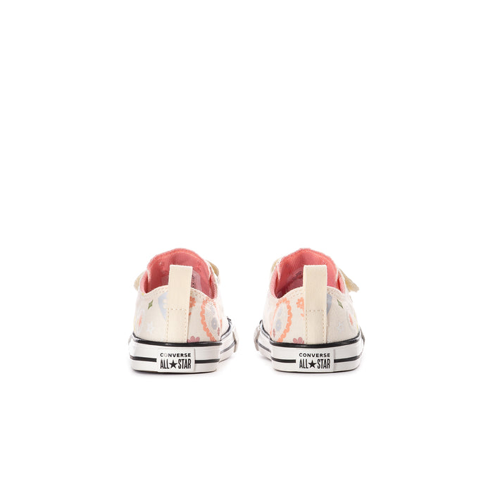 Kids' low-top sneakers, heel back view; paisley print with black rubber heel cap