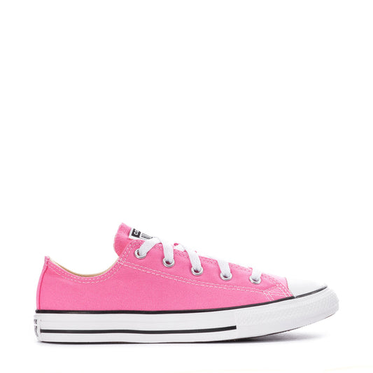 Pink kids low-top canvas sneakers with lace-up front and rubber toe cap.