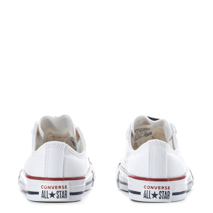Kids white canvas low-top sneakers back view with Converse All Star heel patch detail
