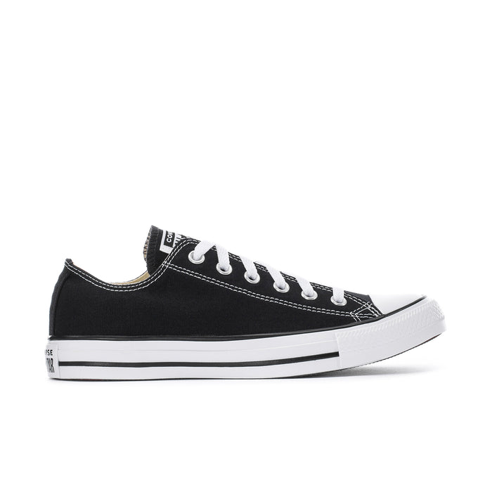 Men's black canvas low-top sneakers with white sidewall stripes and laces