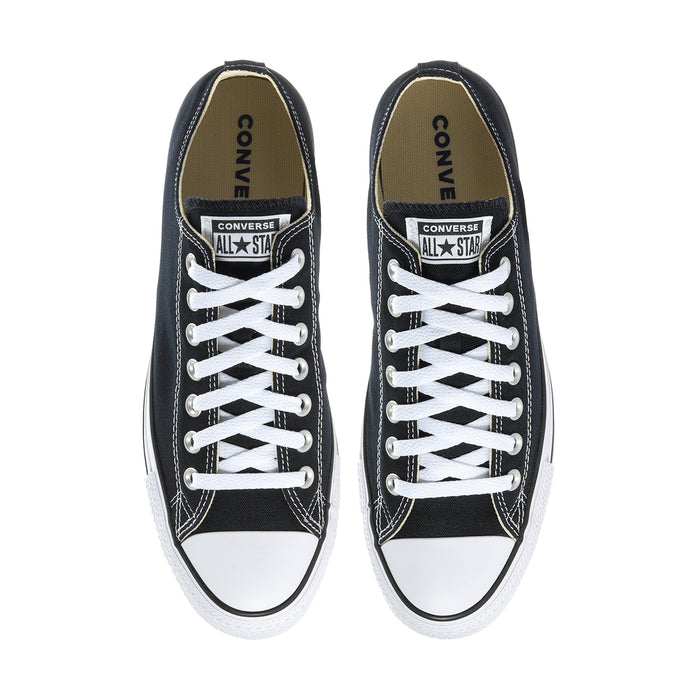 Men's black low-top sneakers with white laces and Converse All Star tongue patch