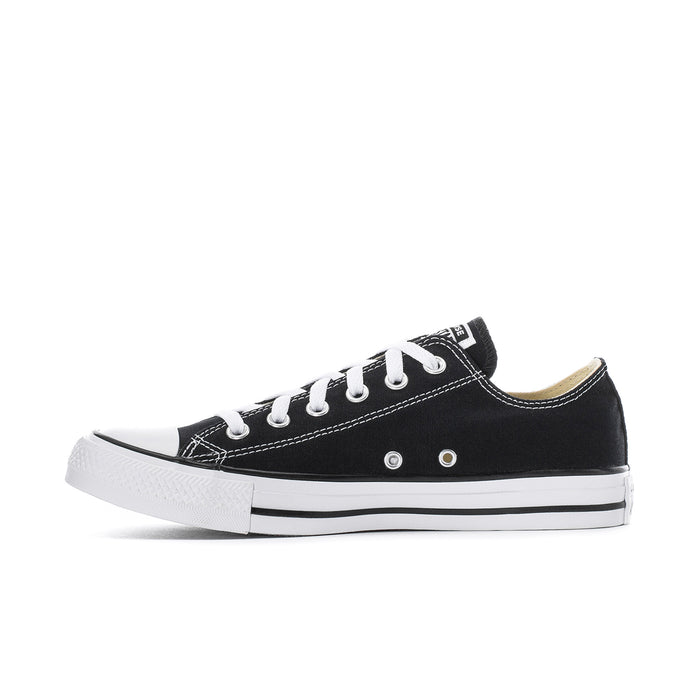 Men's black canvas low-top sneakers with white laces and rubber toe cap
