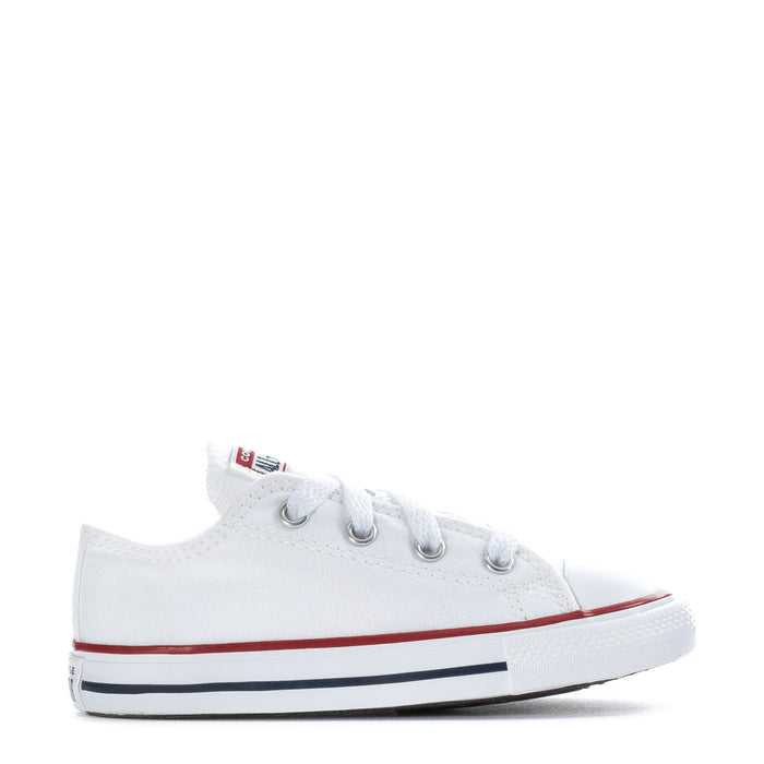 White toddler low-top canvas sneakers with lace-up eyelets and red/blue stripe sole