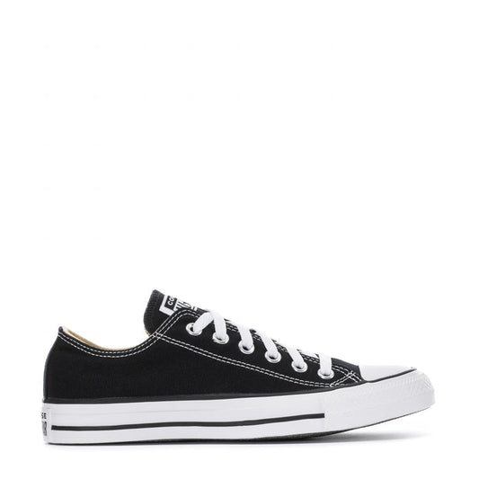 Youth black canvas low-top sneakers with white laces and rubber toe cap