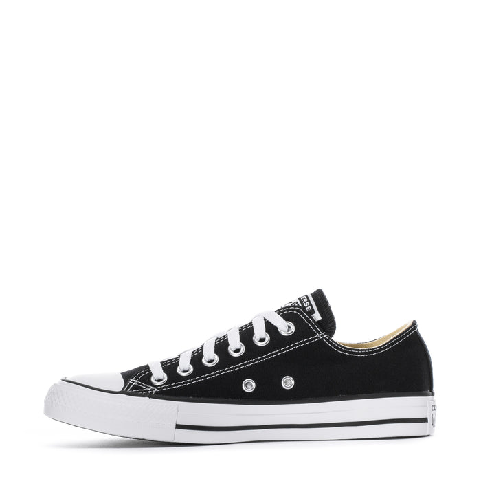 Youth black canvas low-top sneaker with white stitching, lace eyelets, and sole