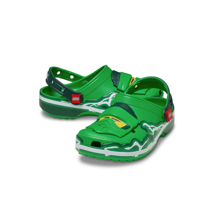 Kids green clog with white lightning graphic, rear strap, molded ventilation holes
