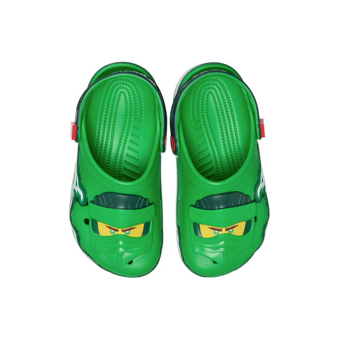 Kids green clogs with multicolor ninja graphics on heel, ventilation holes