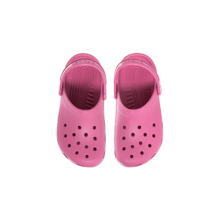 Pink kids' clogs viewed from above with ventilation holes on the toe
