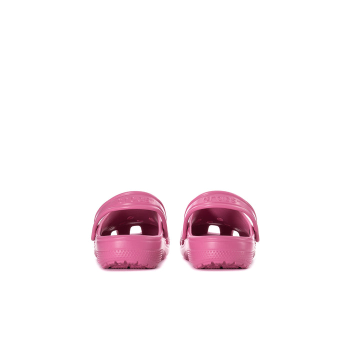 Pink kids' clogs from back with heel openings and molded sole
