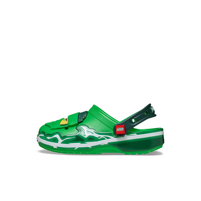 Kids green clog with white lightning graphic and black strap, slip-on design
