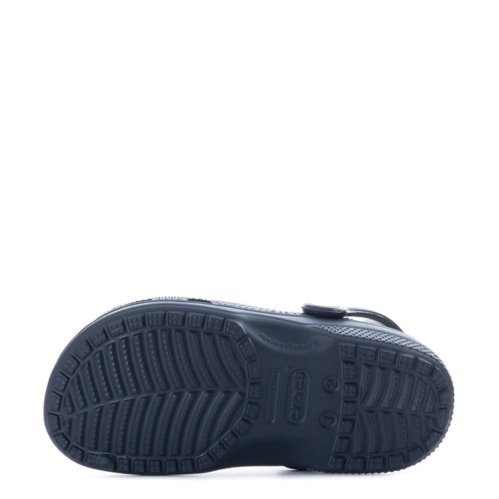 Kids' navy clog with textured outsole tread and grip pattern