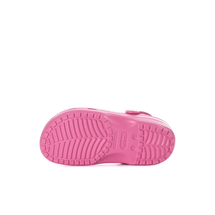 Pink kids' clog outsole with textured tread and molded ridges