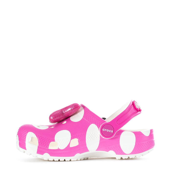 Toddler pink clog with adjustable heel strap and polka-dot pattern
