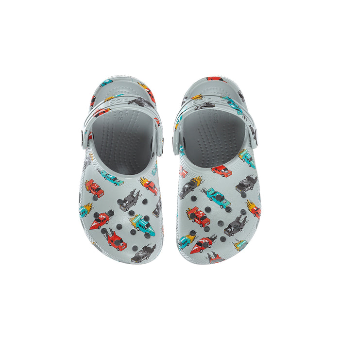 Toddler clog pair viewed from top, light gray with race car pattern