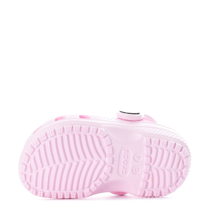Pair of pink toddler clogs showing textured outsole tread and cushioned footbed