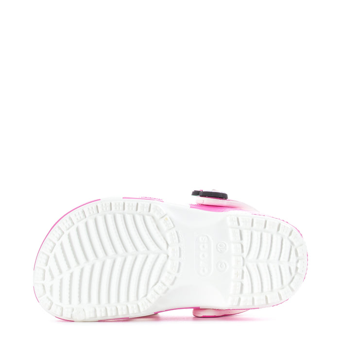 Toddler pink clog sole with traction tread, side view