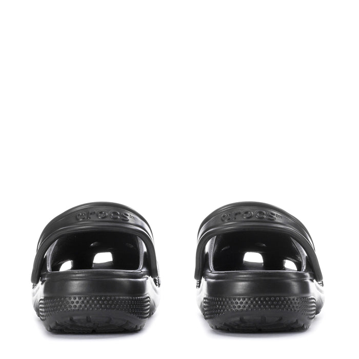 Youth black clogs, rear view showing heel strap and vented back panels.