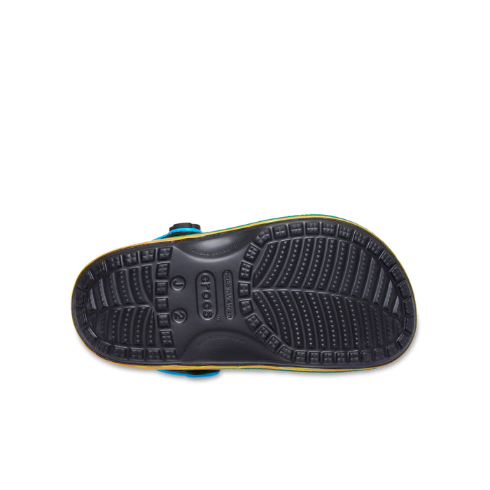 Youth clog outsole in dark gray with tread pattern; blue upper edge visible.