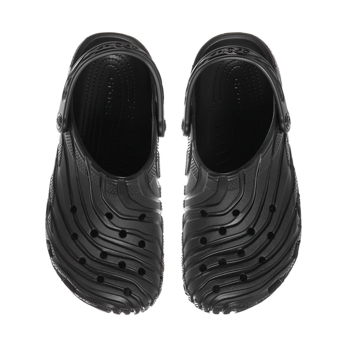 Black men's clog pair view: vented uppers with perforations and textured strap detail.