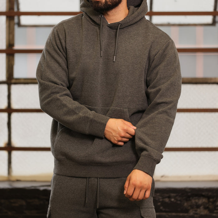 Men's charcoal fleece hoodie worn; hood with drawstrings and kangaroo pocket in front.