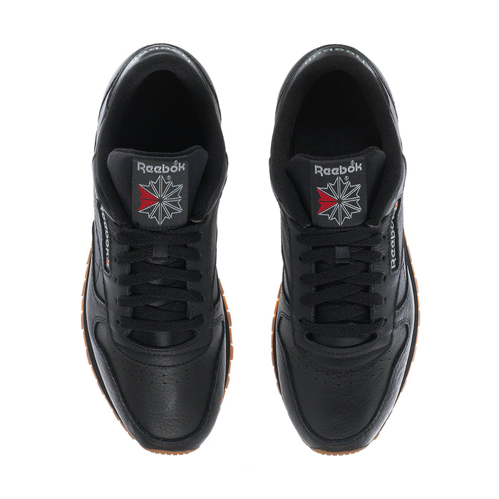 Men's Reebok leather sneakers, black tongue and lace-up front, gum sole edge