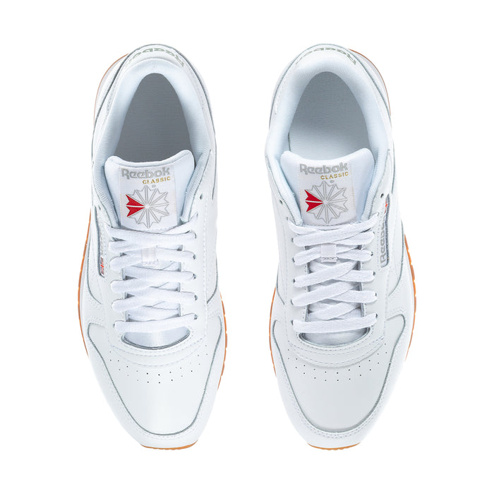 Men's white Reebok lace-up sneakers with tongue logos and perforations, front view