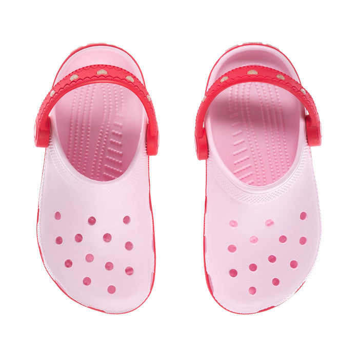 Kids white clog with pink interior, heart perforation dots, and top side strap