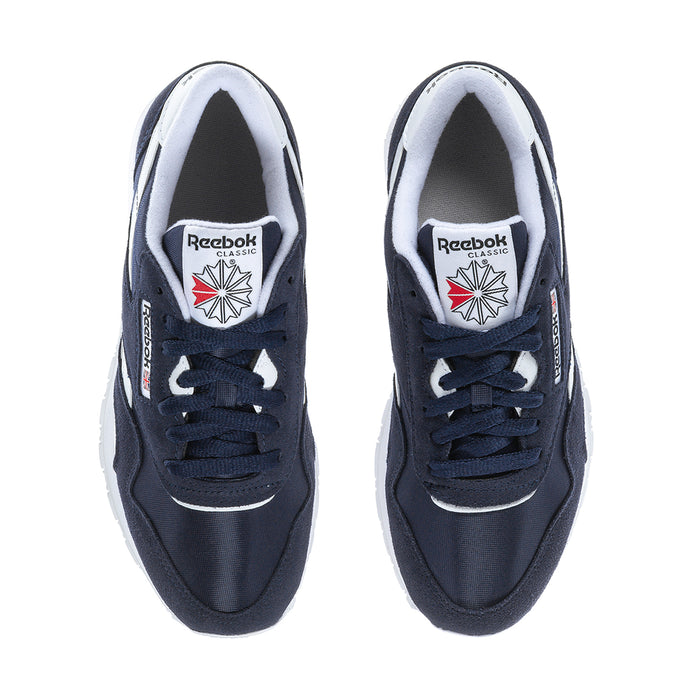 Men's navy low-top sneakers with white lining and Reebok Classics logo on tongue.