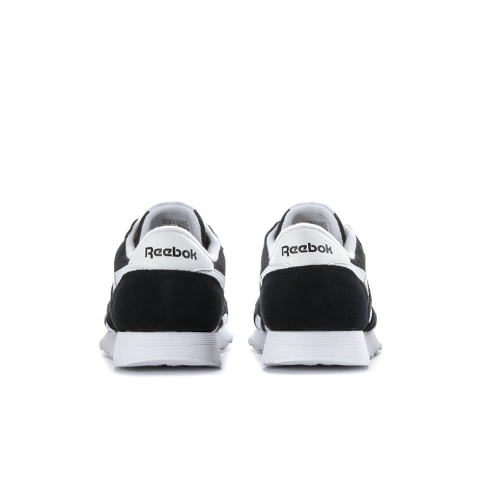 Men's black Reebok sneakers, rear view with white heel tab