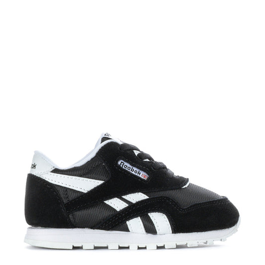 Toddler black and white Reebok sneakers with lace-up front and side stripes