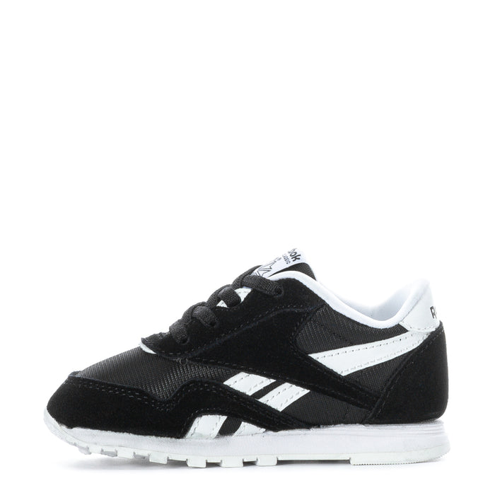 Toddler black and white Reebok sneakers, side view with white midsole