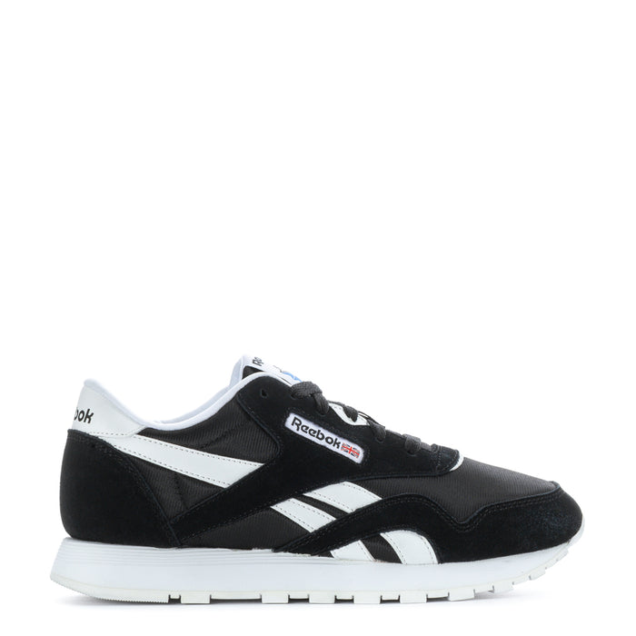 Reebok youth black-and-white low sneakers with side stripes and white sole